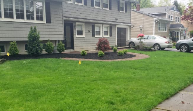 The Mahon Landscaping team gathered together